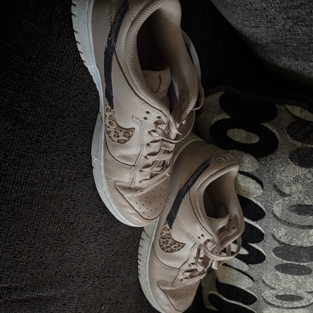 Nike Women's Beige and Black Sneakers with Leopard Accents